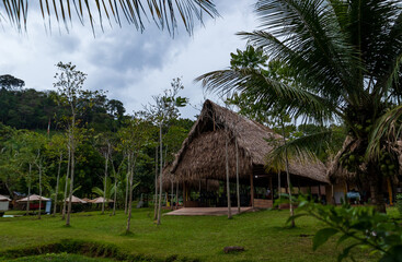 Fototapeta na wymiar Old Amazonian hut in the middle of the lush Peruvian jungle.