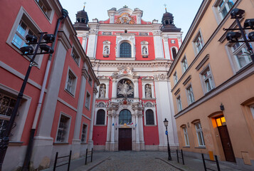 Poznan. Old traditional narrow city street at sunrise.