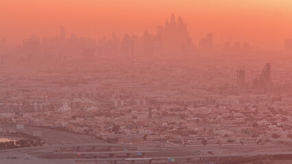 Aerial view of many apartment houses in Dubai city from above timelapse