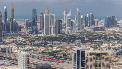 Fototapeta premium Rows of skyscrapers in financial district of Dubai aerial timelapse.