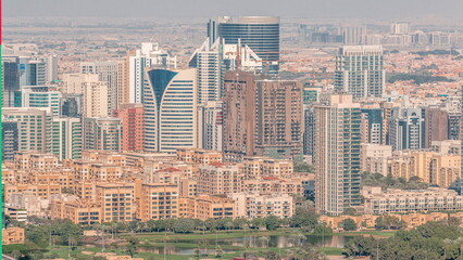 Aerial view of media city and al barsha heights district area timelapse from Dubai marina.