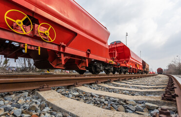 Train wagons carrying freight containers for shipping companies. distribution and freight transport by a railway, transport concept