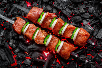 Fresh meat shish kebab cooked on charcoal