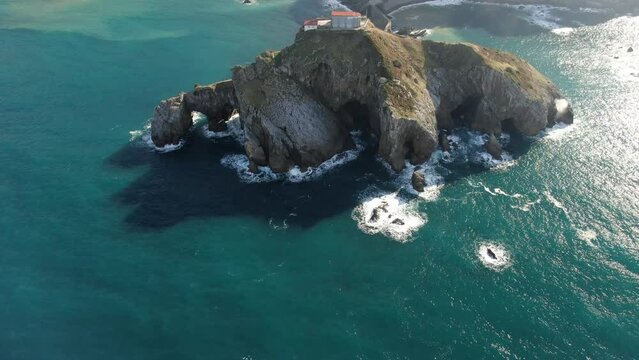 Aerial view of the island and the Gaztelugatxe temple. Northern Spain in winter. Drone footage