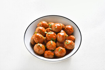 Meatballs with tomato sauce in bowl