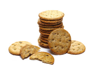 Crunchy linseed crackers, integral snacks with sunflower, barley, sesame isolated on white  