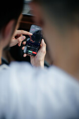 hand holding a camera