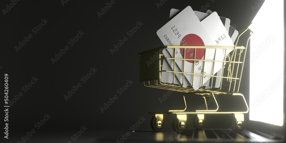 Poster bank card mockups with flags of japan in a small shopping cart on the computer. conceptual 3d render