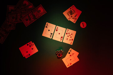 Casino and gambling concept. Poker table with money, cards and chips. Top view