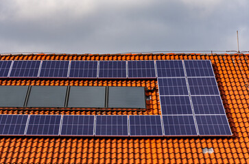 Photovoltaic panels to generate electricity from the sun on the roof of the house