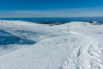 Fototapeta na wymiar Winter view of Vitosha Mountain near Cherni Vrah peak, Bulgaria