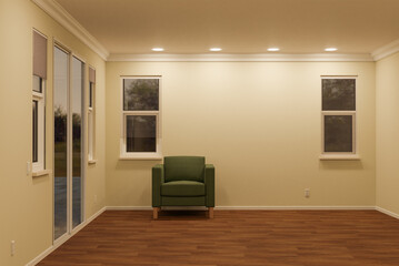 Chair Sitting on the Floor in Empty Room of House with Blank Wall.