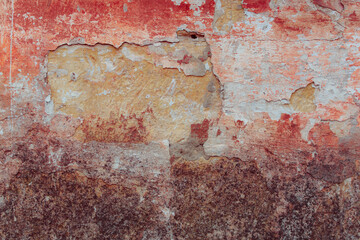 Red concrete wall. Antique surface with roughness and cracks. Restoration concept. Universal substrate for design. The main layer for advertising.