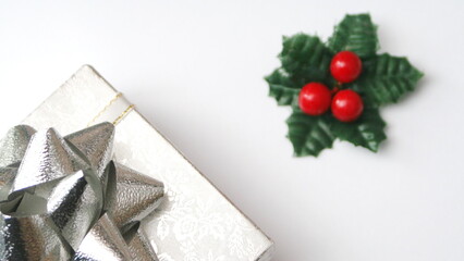 silver gift box and silver ribbon on white background