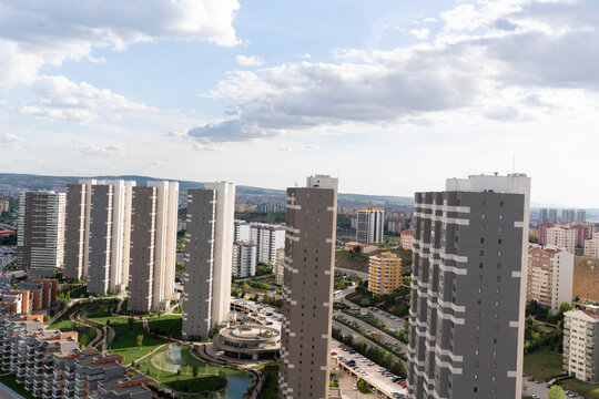 Cityscape of a modern residential area with apartment buildings, new green urban landscape in the city