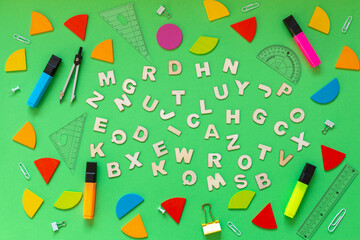 Colorful math fractions, numbers, letters on green background. Interesting, fun math for kids....