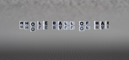 whole ball of wax word or concept represented by black and white letter cubes on a grey horizon...
