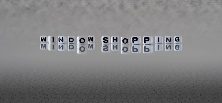 window shopping word or concept represented by black and white letter cubes on a grey horizon background stretching to infinity