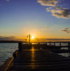 Fototapeta na wymiar Lake Washington Sunset from board walk at Marina Park on Moss Bay in Kirkland