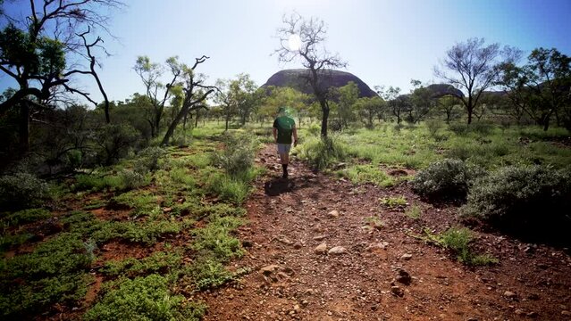 Man commencing bush walk in the unique landscape of outback Australia, Northern Territory