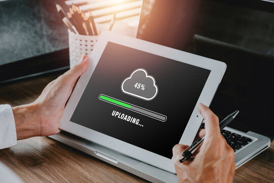 Upload data concept, Person hand using and waiting for cloud uploading on digital tablet, Data infomation, Technology network internet Concept...