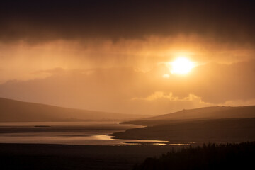 Bright sunset over Lough Carrowmore, County Mayo, Ireland