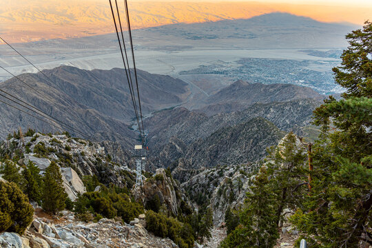 Cable car leading up to Mount San Jacinto in Palm Springs during sunset with pastel background. 