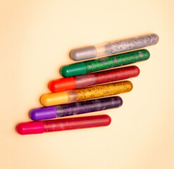 Glittering colorful pens