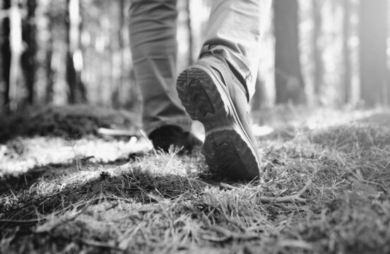 walking on the grass. Black and white toned image