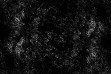 Fototapeta na wymiar Abstract textured dark stone wall surface with heavy grunge texture