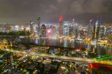 Fototapeta premium Aerial Brisbane City, Queensland Australia Downtown Region Aerial Night Highway cars streak Sunset Dusk Evening River All Logos Blurred