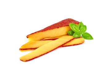 Hard cheese with red sun-dried tomatoes, herbs, basil, isolated on white background.
