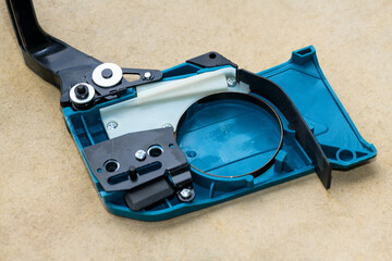 Chainsaw chain cover for fixing cutting part, close up