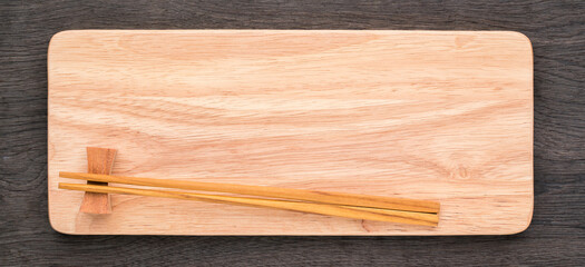 Empty sushi tray board on white background. Top view of plank wood for graphic stand product, interior design or montage display your product.