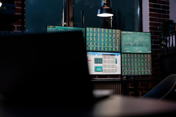 Empty stock trade company office workstation with multiple displays in modern interior. Interior of...