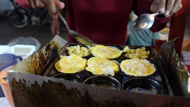the process of making cilor, which is a typical Indonesian street food