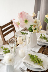 The wedding table setting and decor on wooden table in rustic style