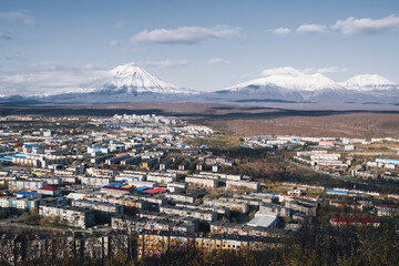Capital of Kamchatka Petropavlovsk-Kamchatsky city  view with volcano peaks on the horizon
