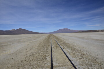Railway rails on the territory of Salar de Uyuni, Bolivia