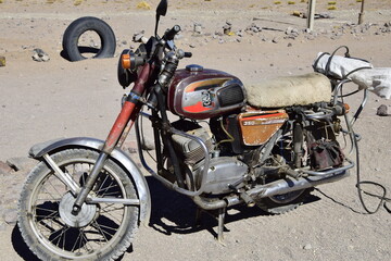 An old broken motorcycle, on Eduardo Avaroa National Reserve in Uyuni, Bolivia at 4300 m above sea level.