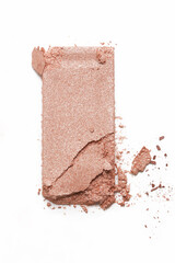 Smashed neutral toned makeup sample isolated on white background