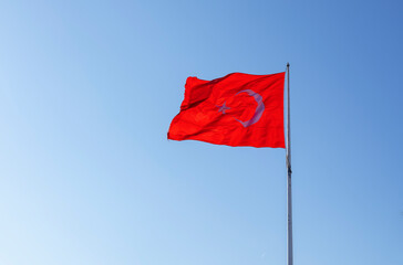 Turkish flag in front of the blue sky