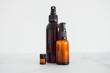 natural beauty and organic ingredients in skincare, apothecary skincare bottles on white marble