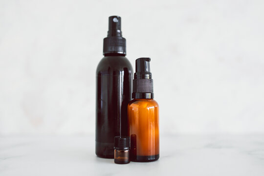 natural beauty and organic ingredients in skincare, apothecary skincare bottles on white marble