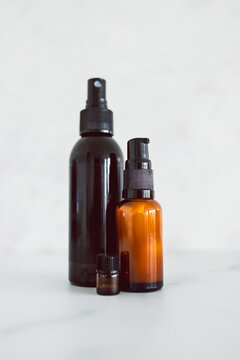 natural beauty and organic ingredients in skincare, apothecary skincare bottles on white marble