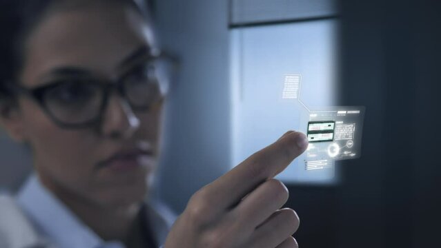 Female scientist computer engineer holding microchip hardware processing data,cyber security science nanotechnology concept,graphic animation