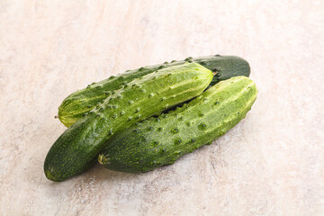 Fersh juicy green cucumbers heap