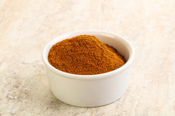 Obraz na płótnie Canvas Dry Paprika powder in the bowl