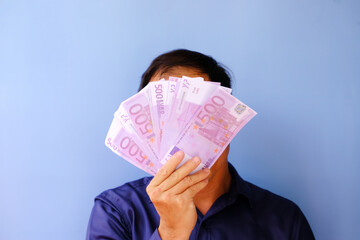 Man holding a big amount of money, Finance and investment concept.background, bank, banknote