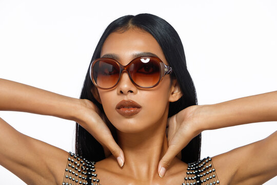Half body of 20s Asian woman tanned skin black long straight hair with Fashion Luxury glasses